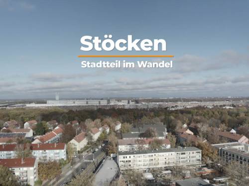 Film-Screenshot mit der Überschrift "Ich mag Stöcken! Einblicke in die städtebauliche Sanierung" und dem Stöckener Marktplatz im Hintergrund.